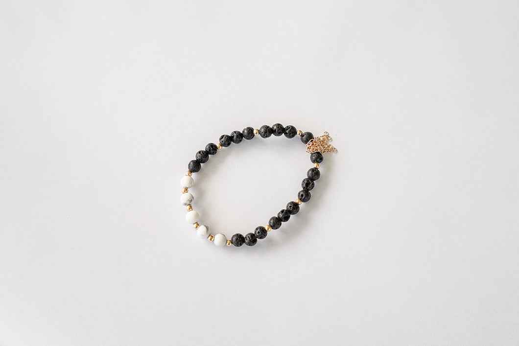 Mini Gold Tassel Howlite Lava Bead Bracelet